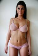 Gorgeous, curvy, fit MILF in sheer, light pink bra and panties... (Who is she?)