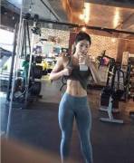 Fit asian girl taking a selfie