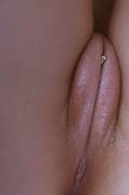 Piercing peeking out