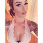 Tattoos, cleavage, eyelashes