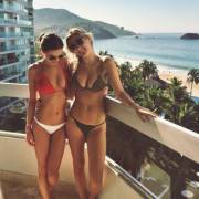 Two hot girls on a balcony