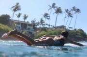Paddling out.