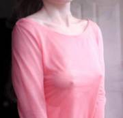 braless bouncing under a pink shirt