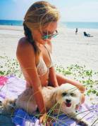 Girl and dog at beach