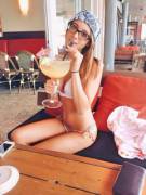 Summer babe enjoying a drink