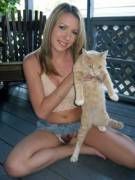 showing off both of her kitties