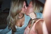 Teen girlfriends sharing an intimate moment.