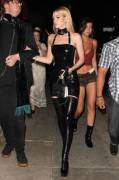 Nicola Peltz latex dominatrix for Halloween