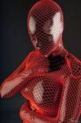 Red fishnet over black