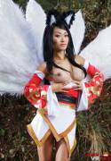 Ahri from league of legends showing the goodies