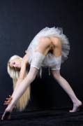 Blonde ballerina bent over