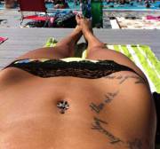 Tattoos and tan skin