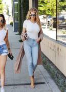 Charlotte McKinney in jeans and a white top
