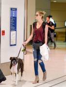 Kate Upton and her dog in LAX