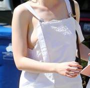 Elle Fanning no bra and nipple slip