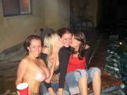 Naked partying with her clothed friends