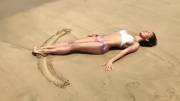 Anna Sidorova making a sand angel