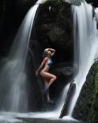 Sara under the water with blue suit