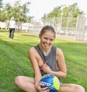 Soccer girl sneaks one out.