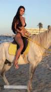 Posing with a horse in swimsuit (GIF)