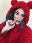 Blue lips and a fluffy onesie