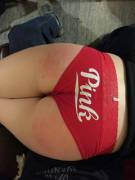 Spanked, bent over his knee in cute Pink panties