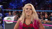 Alexa Bliss leering at Renee Young