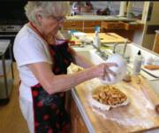 Grammy stuffs her huge pie until it can't take any more!