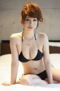 Asian redhead girl in black bikini