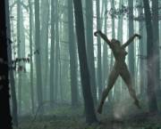 Girl hanging spreadeagled in the woods. 3d image by [kangurubicon]