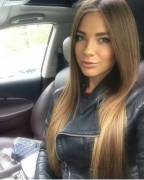 Brunette in car