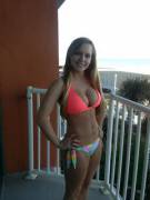 Cute babe on the balcony