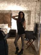 In the room.