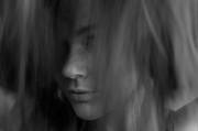 Through tumbling hair