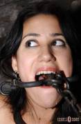 Seriously heavy duty gag, but she's enjoying it!