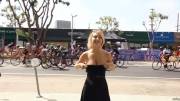 Lily Ivy flashing at bike race