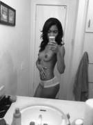 Sexy ebony beauty shoots a selfie (B&amp;W)