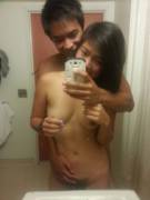 Amateur Asian couple having fun at home