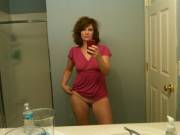 Bottomless milf in bathroom