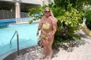 BBW blonde in a tiny yellow bikini