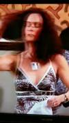 Monica (Courtney Cox) showing off and sniffing her armpits.