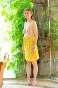 Lara in a yellow polka dotted skirt