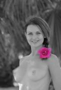 Pink flower in her braid