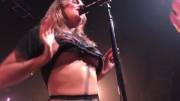 Tove Lo flashing during a concert