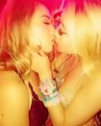 Two Asian Babes Kiss at a Rave