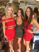 Three Beauties in Tight Dresses Facing Us