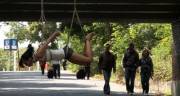 Roped up and suspended in an underpass for the whole world to see!