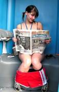 Reading the paper in a porta-potty