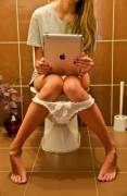 Using her iPad