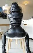 Tight shiny black latex encasing her thick ass